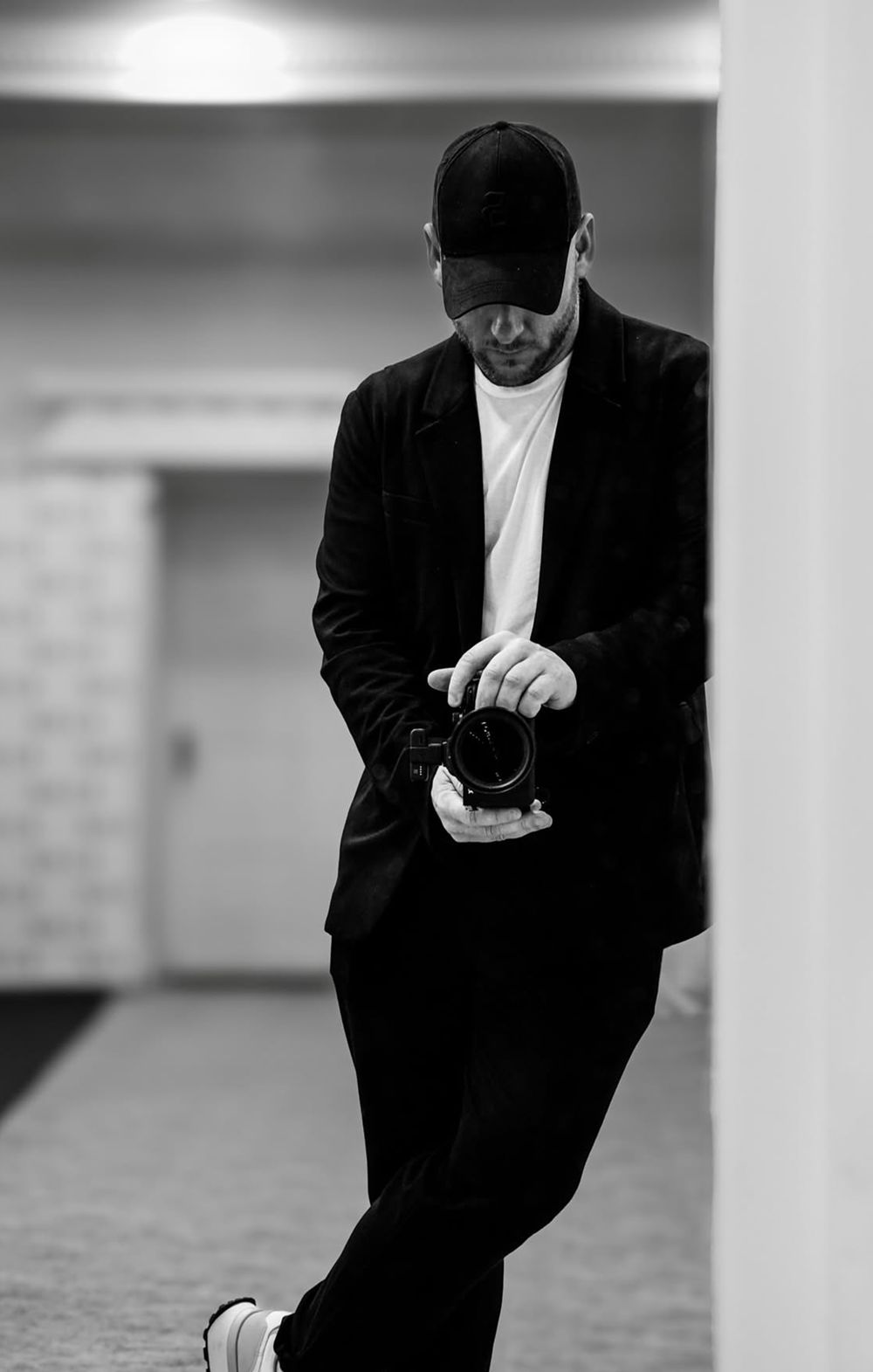 Kyle Burrows, The Social Media Guy, holding his camera